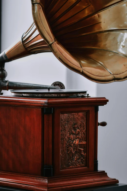a musical instrument is on top of a record player