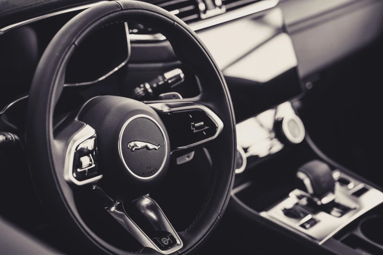 an interior view of a car with the dash wheel and control