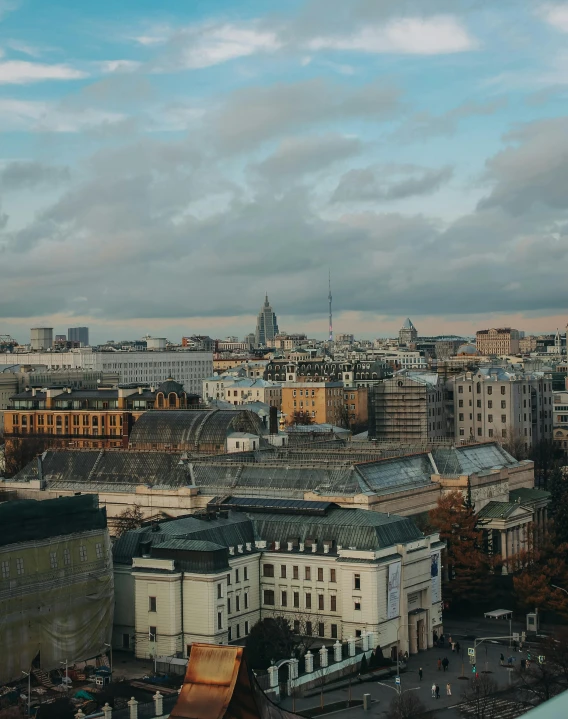 an aerial view of a city with tall buildings