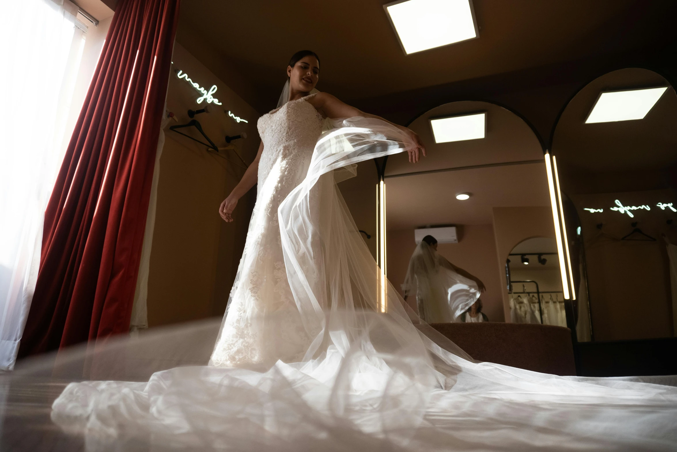 a woman in a white gown and veil