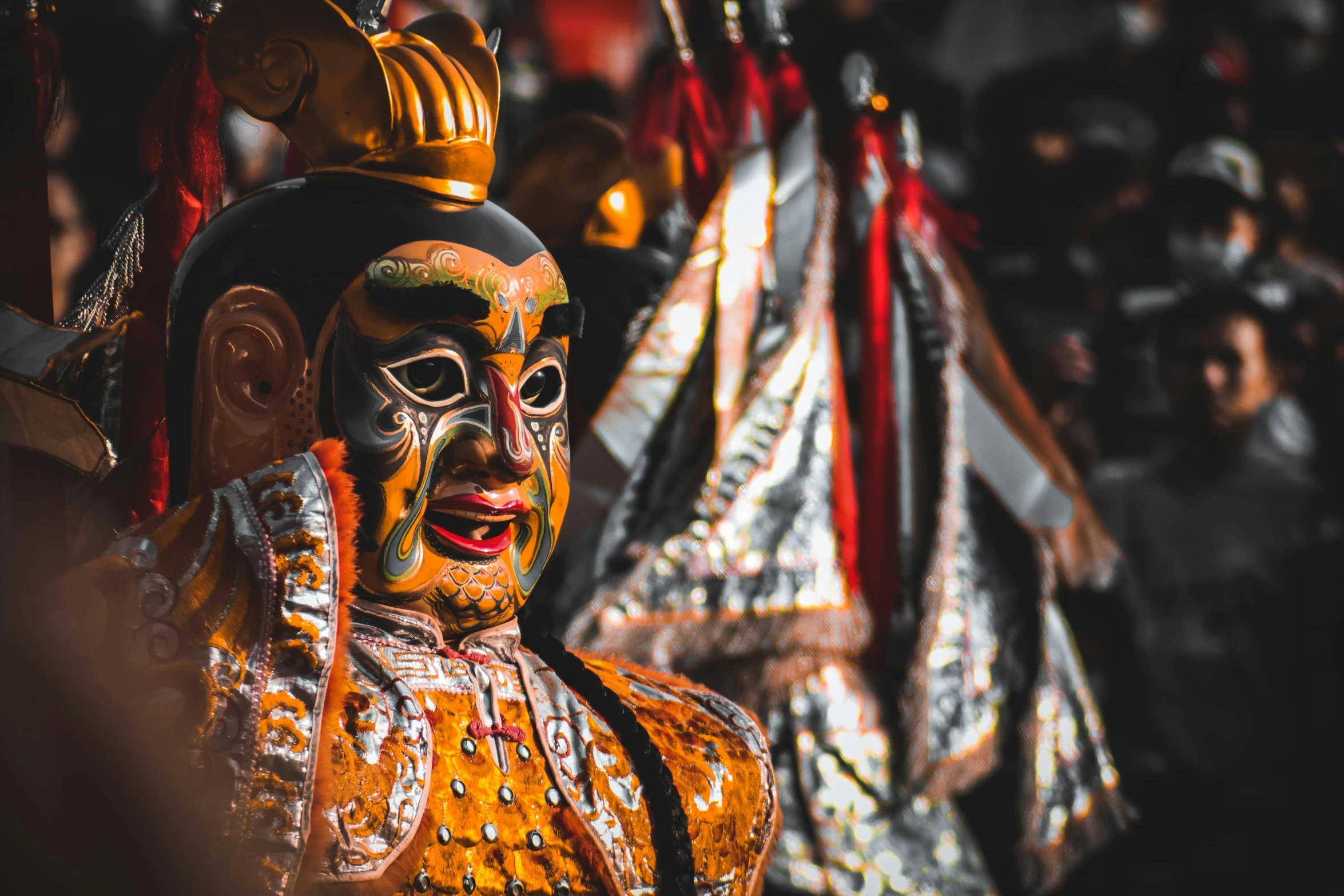 a decorated statue with many decorations at a festival