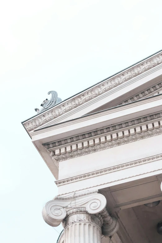 the corner of a building with the top on