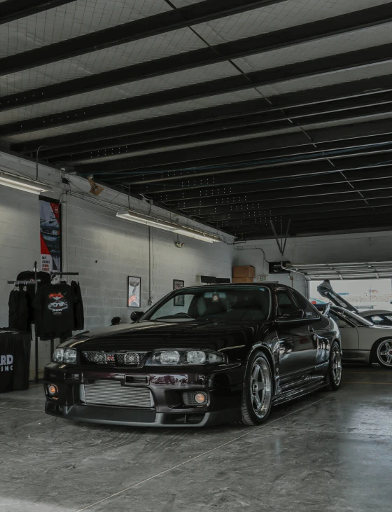 a large garage with cars and other accessories