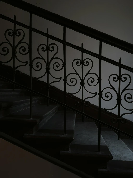 stairs and wrought iron hand rails with railing
