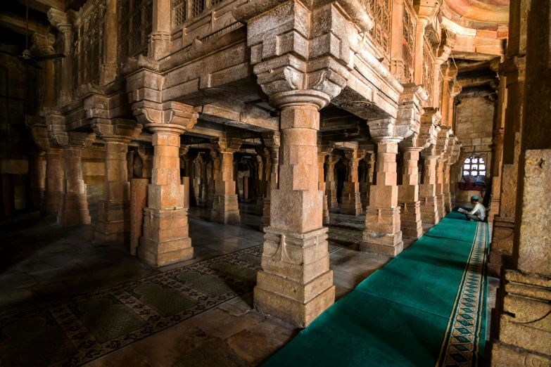 a cathedral with columns, pillars, and a table