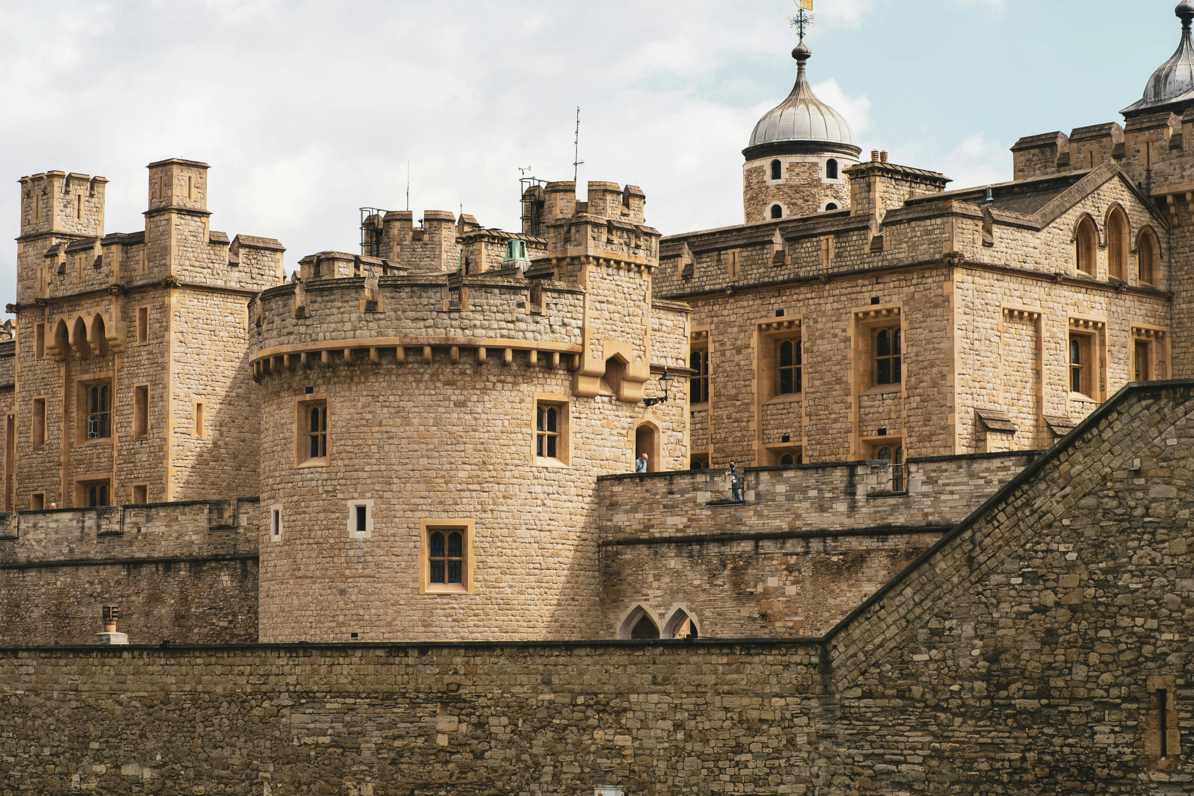 there are many castle like building with white roof tops