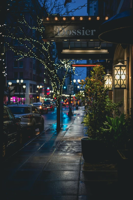 city night scene with cars and pedestrians on street