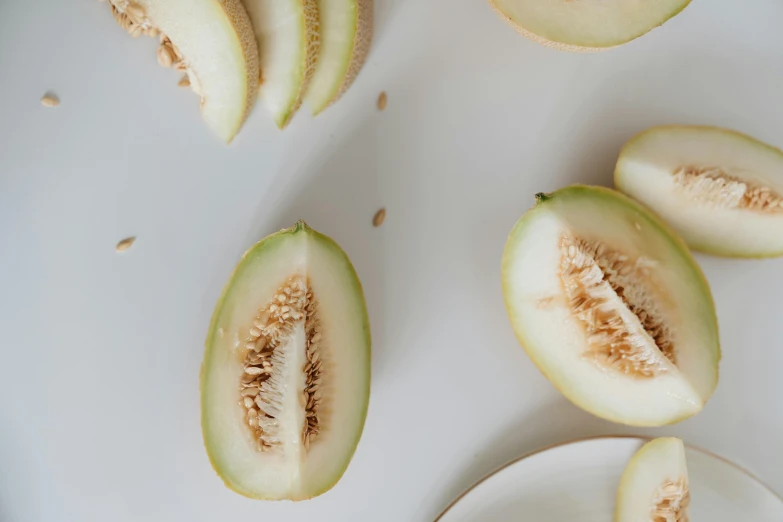 slices of ripe melon on a plate set