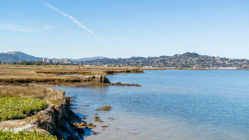 a lake that is sitting next to the shore