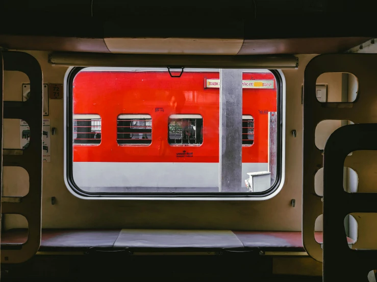 an overhead view shows a train's windows with bars