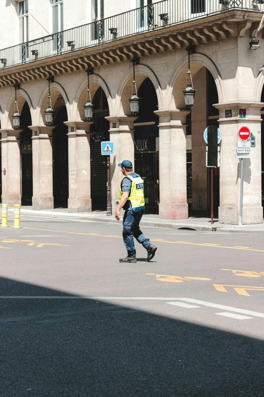 a person wearing a helmet skateboarding on the street