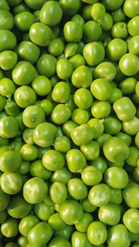 a background with green apples in multiple layers