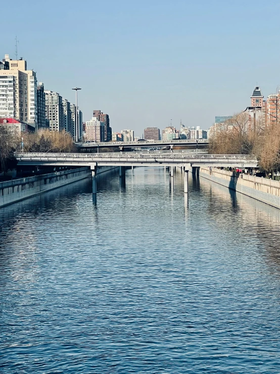 a bridge that is spanning a large body of water