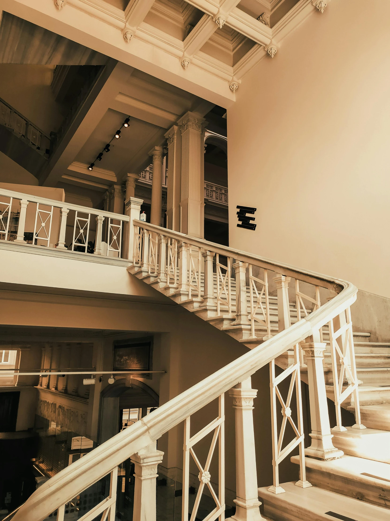 sepia toned pograph of an elegantly decorated staircase