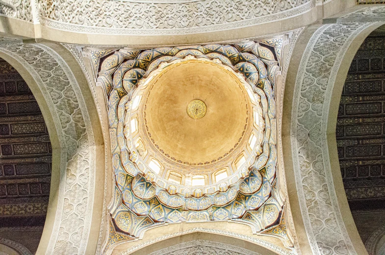 a decorative ceiling that has circles and crosses on it