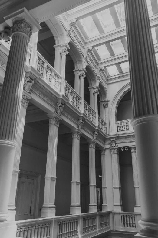 a large, ornate building with columns and ceilings