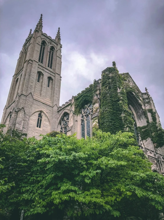 the view of a building with an arched tower