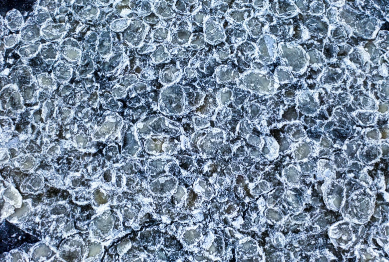 a large slab of granite with a black background