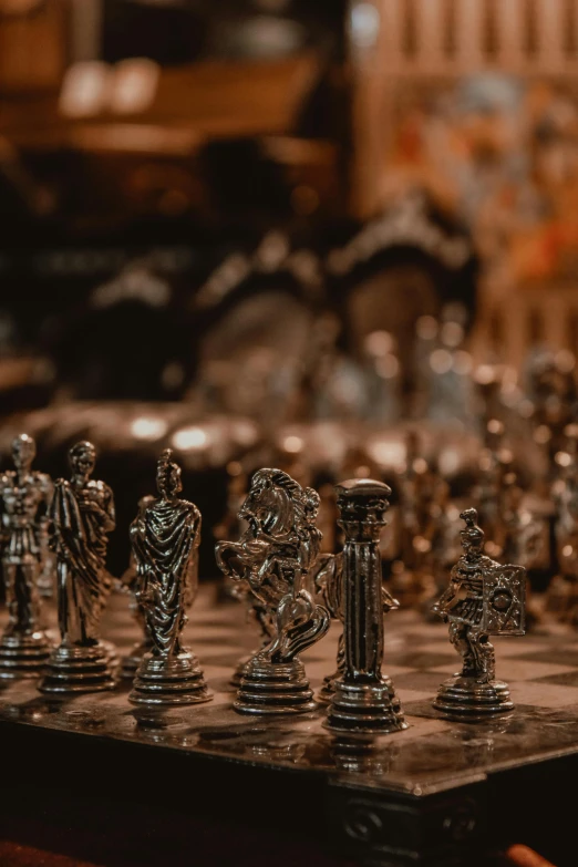 a chess game with all metal decorations on top