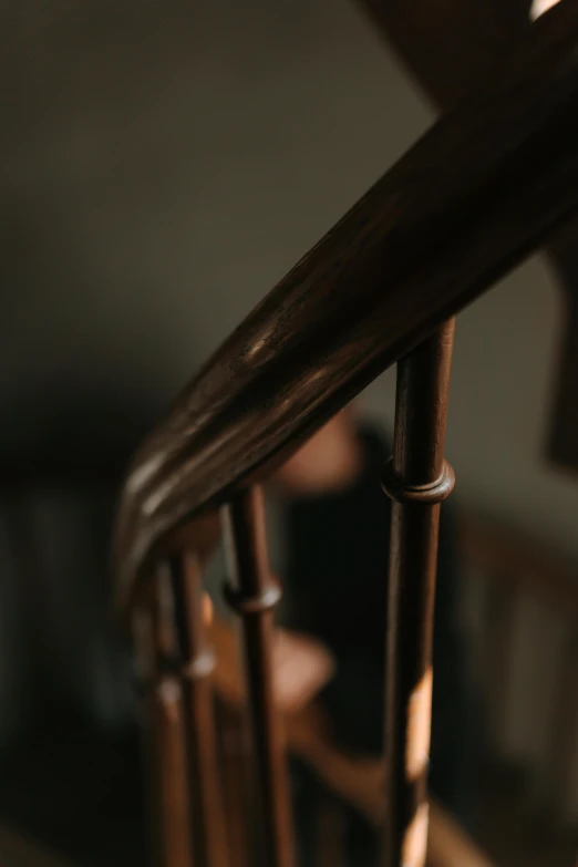 a close up view of two wooden chairs in a room