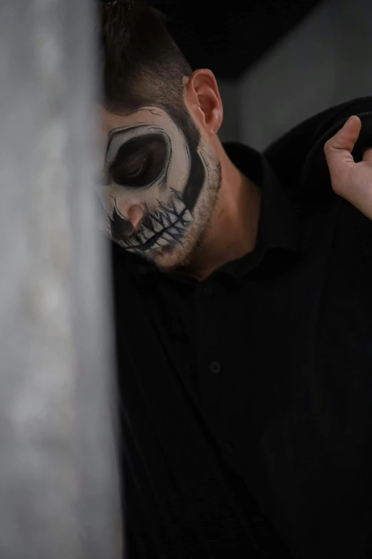a man in a skeleton face painted skeleton makeup