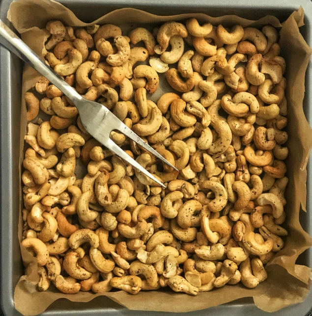 this is a square pan filled with nuts