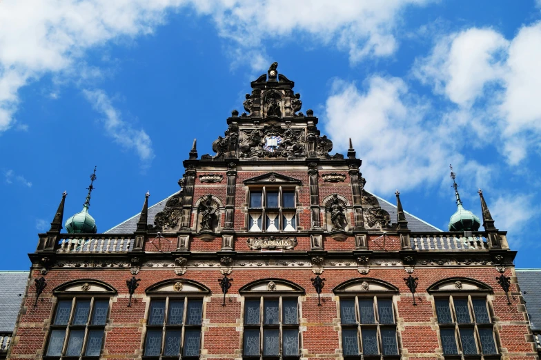 a big building with some clock at the top