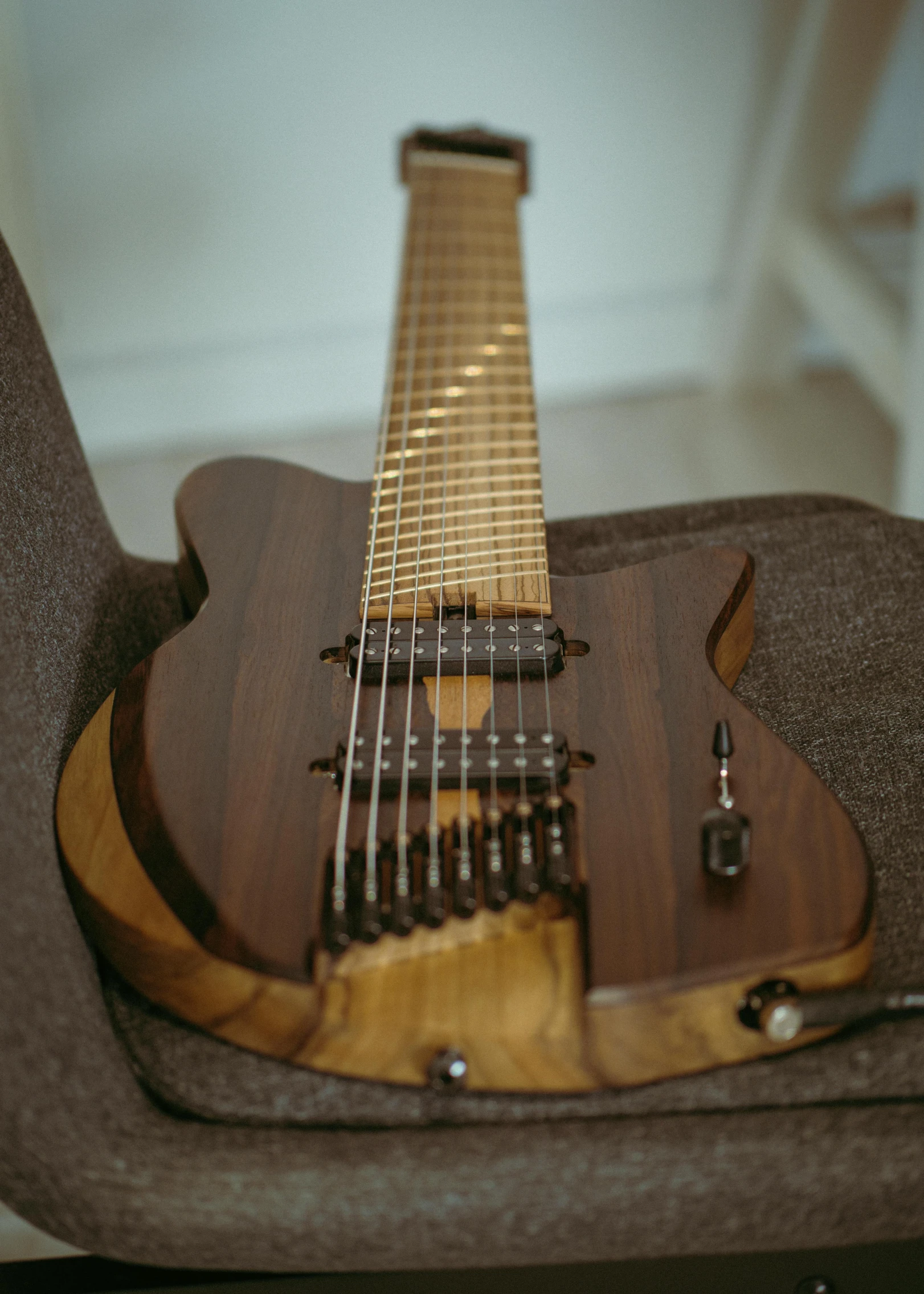 a guitar case made out of a small piece of wood