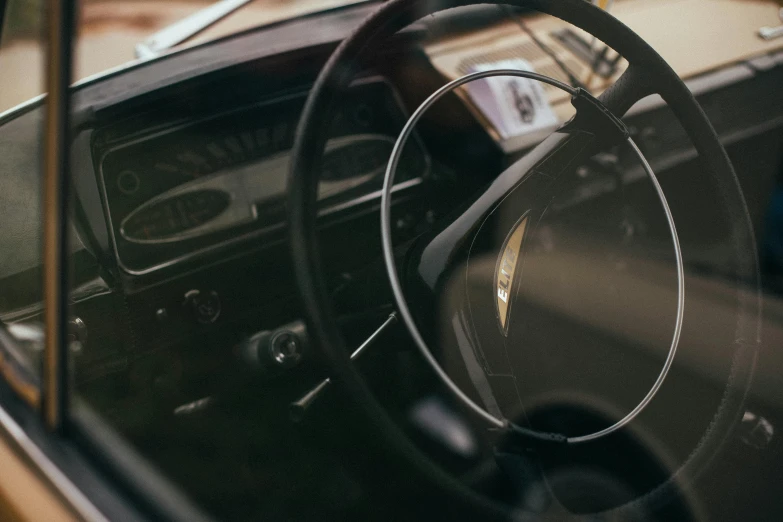 view of car dashboard, steering wheel and dashboard dash board