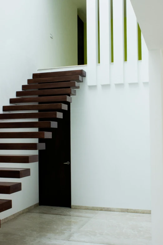 a bunch of stairs are in a white room