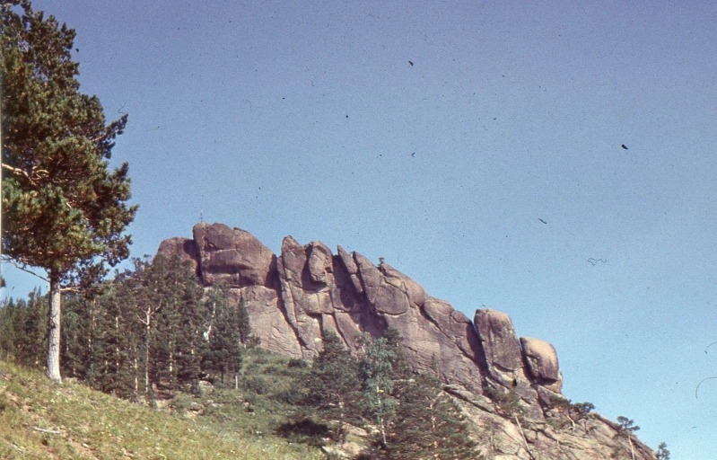 a large rock formation in the middle of the desert