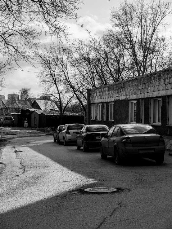 a parking lot with cars parked in front