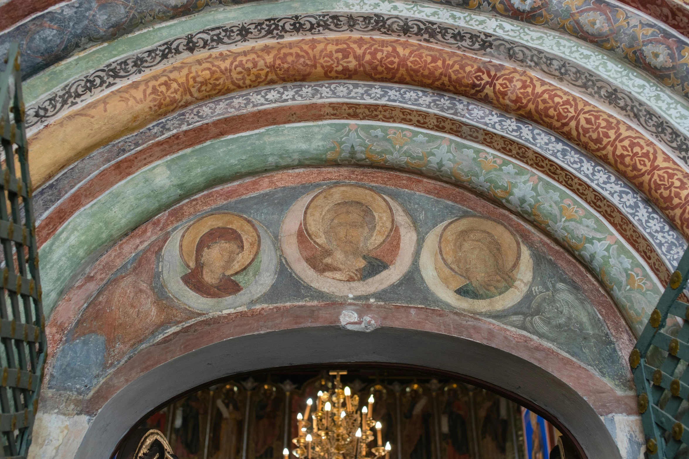 the mural on the wall is depicting three women