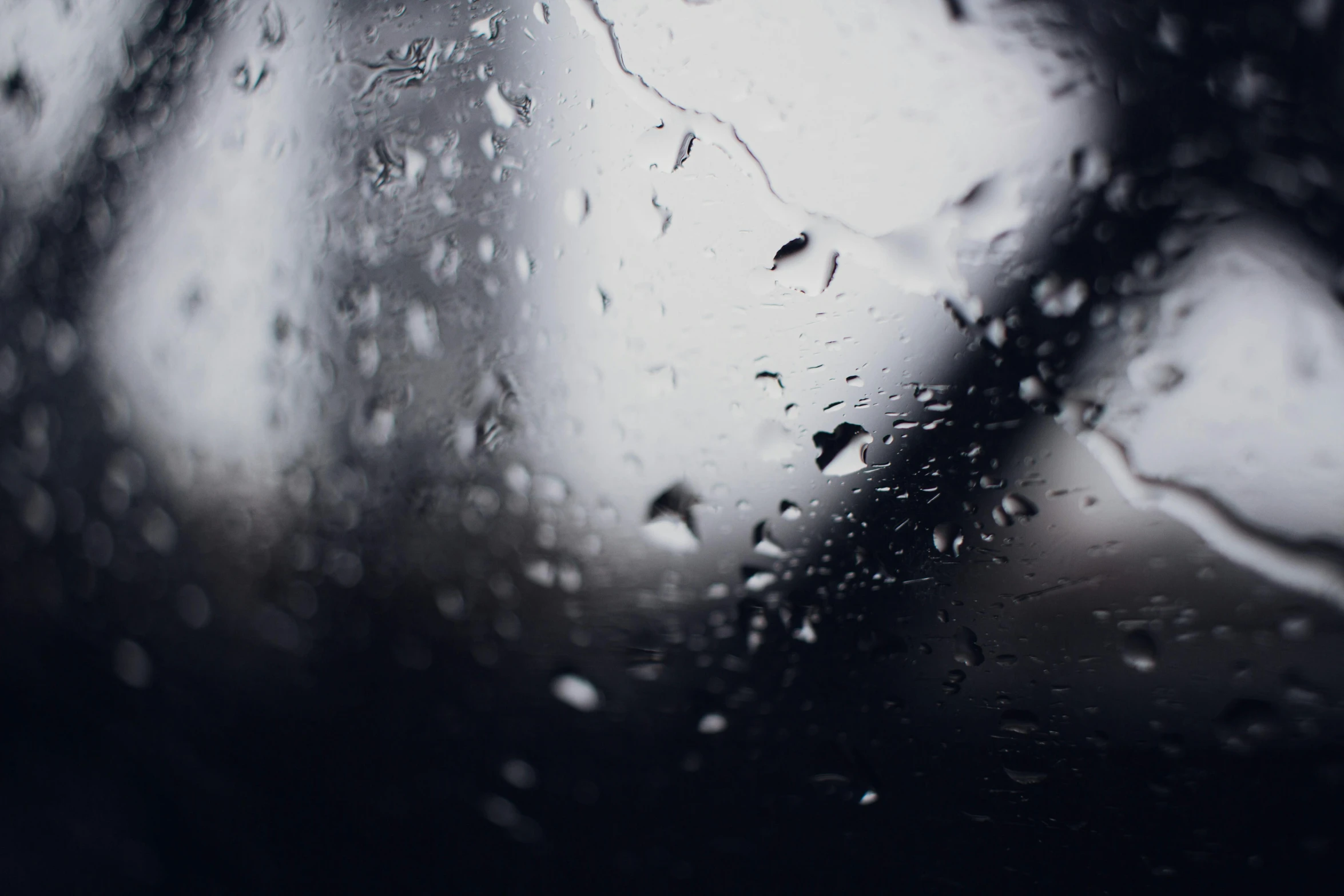 rain drops on the glass of an automobile