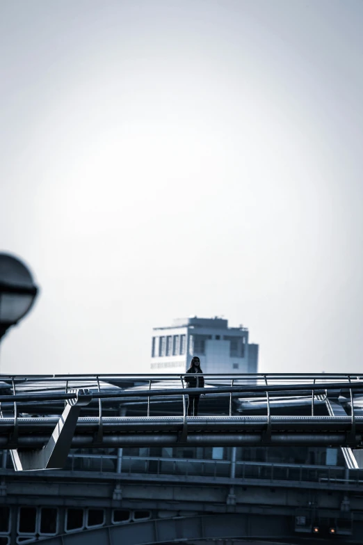 a man walks on the roof of a building