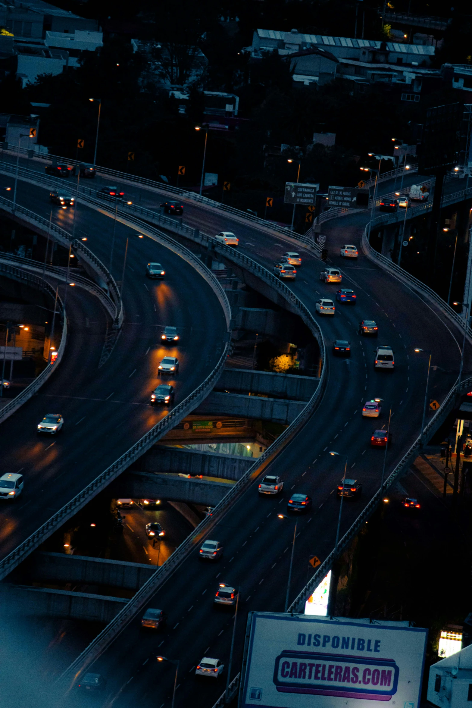 a view from the top of a tall building at night