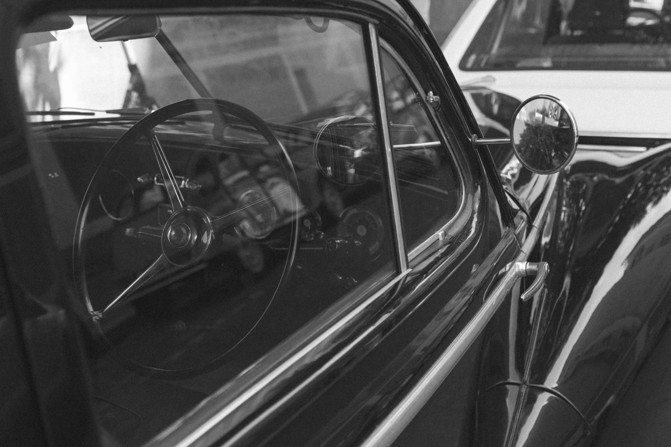 a side view mirror on a parked car