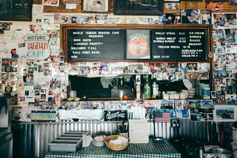 a restaurant with several pictures on the wall