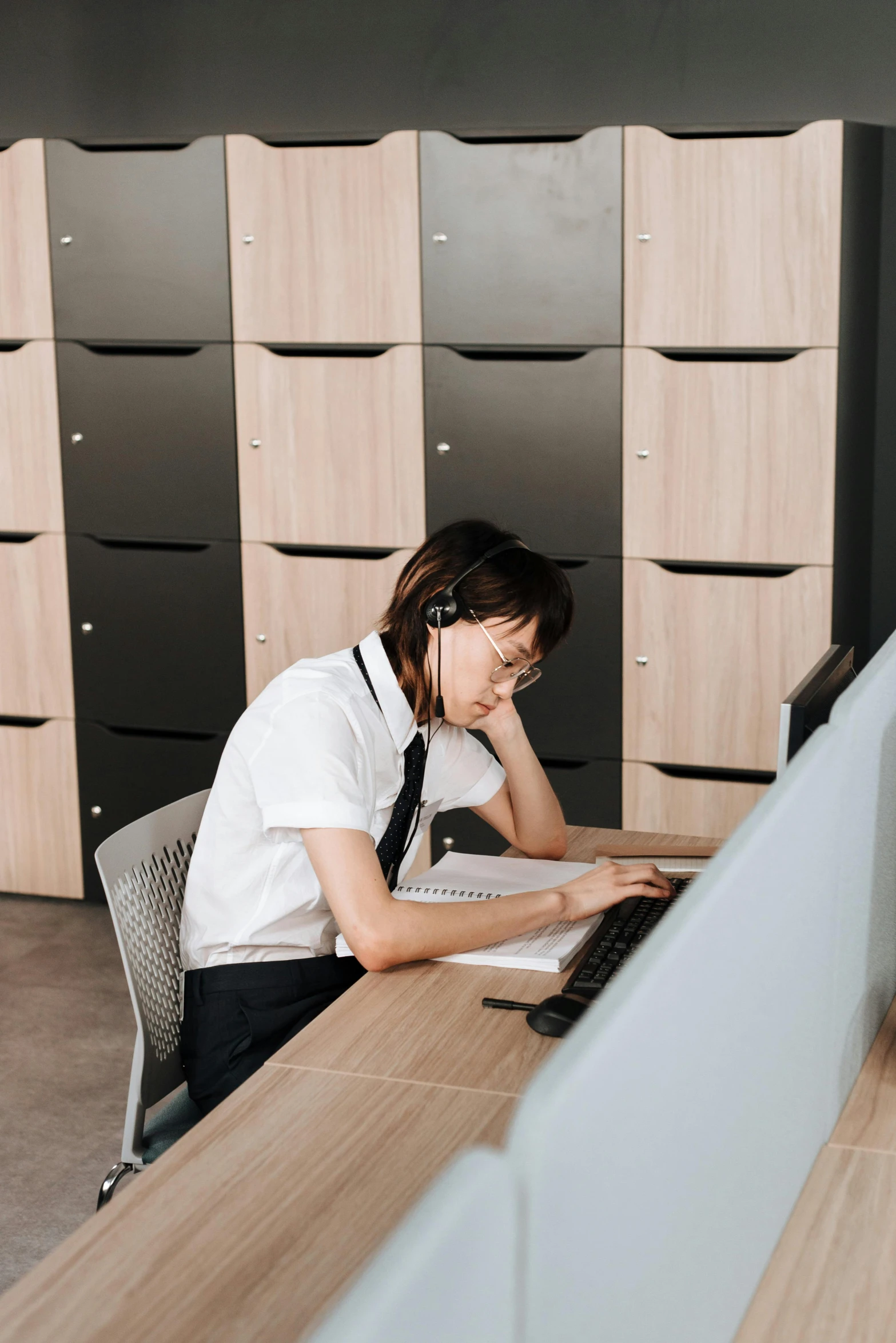  working on a computer in an office