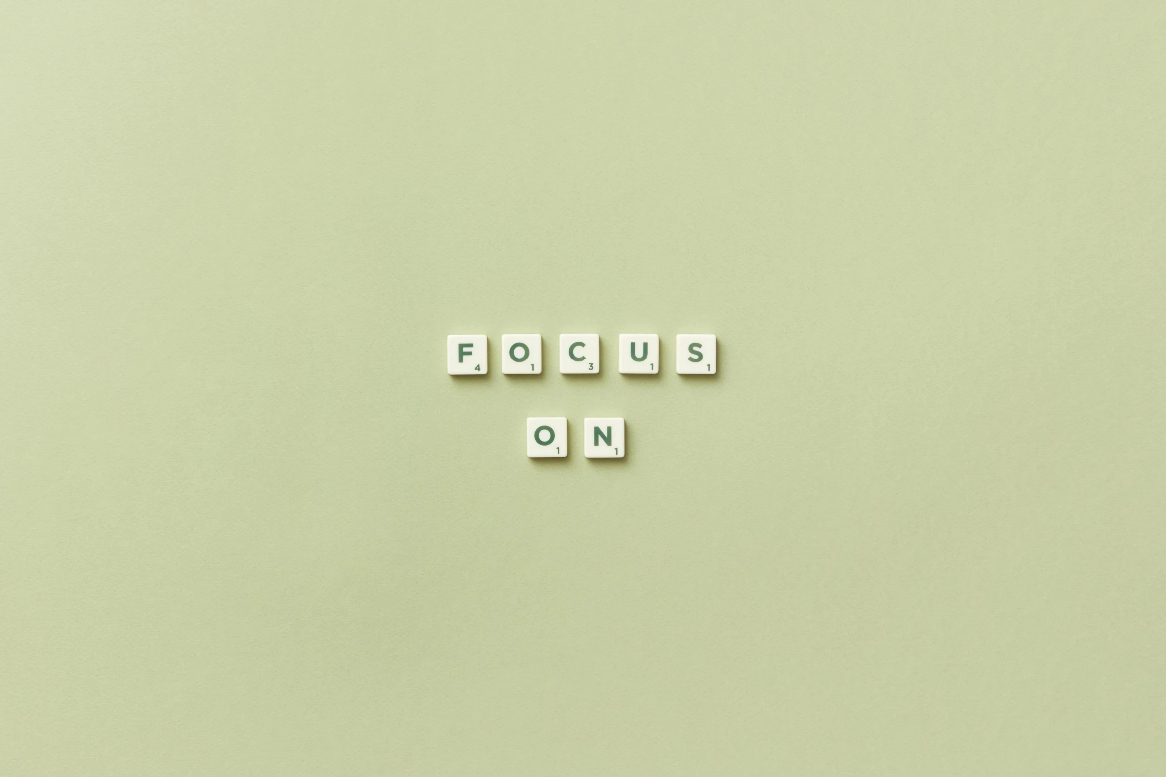 a picture of the words focus on it written in scrabble letters