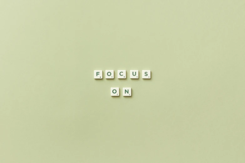 a picture of the words focus on it written in scrabble letters