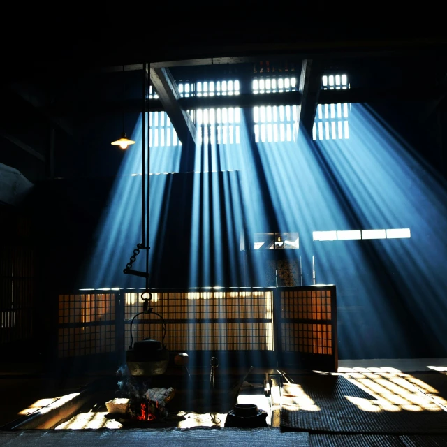 rays streaming through the window from inside an empty building