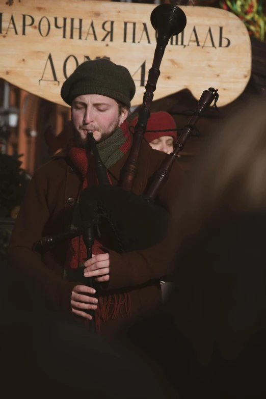 a man with a bagpipe in his hands