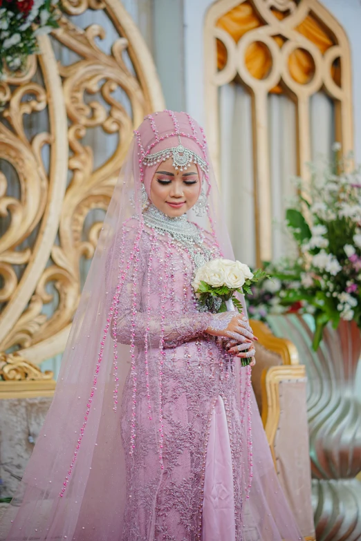 a woman in a wedding dress is posing for a po