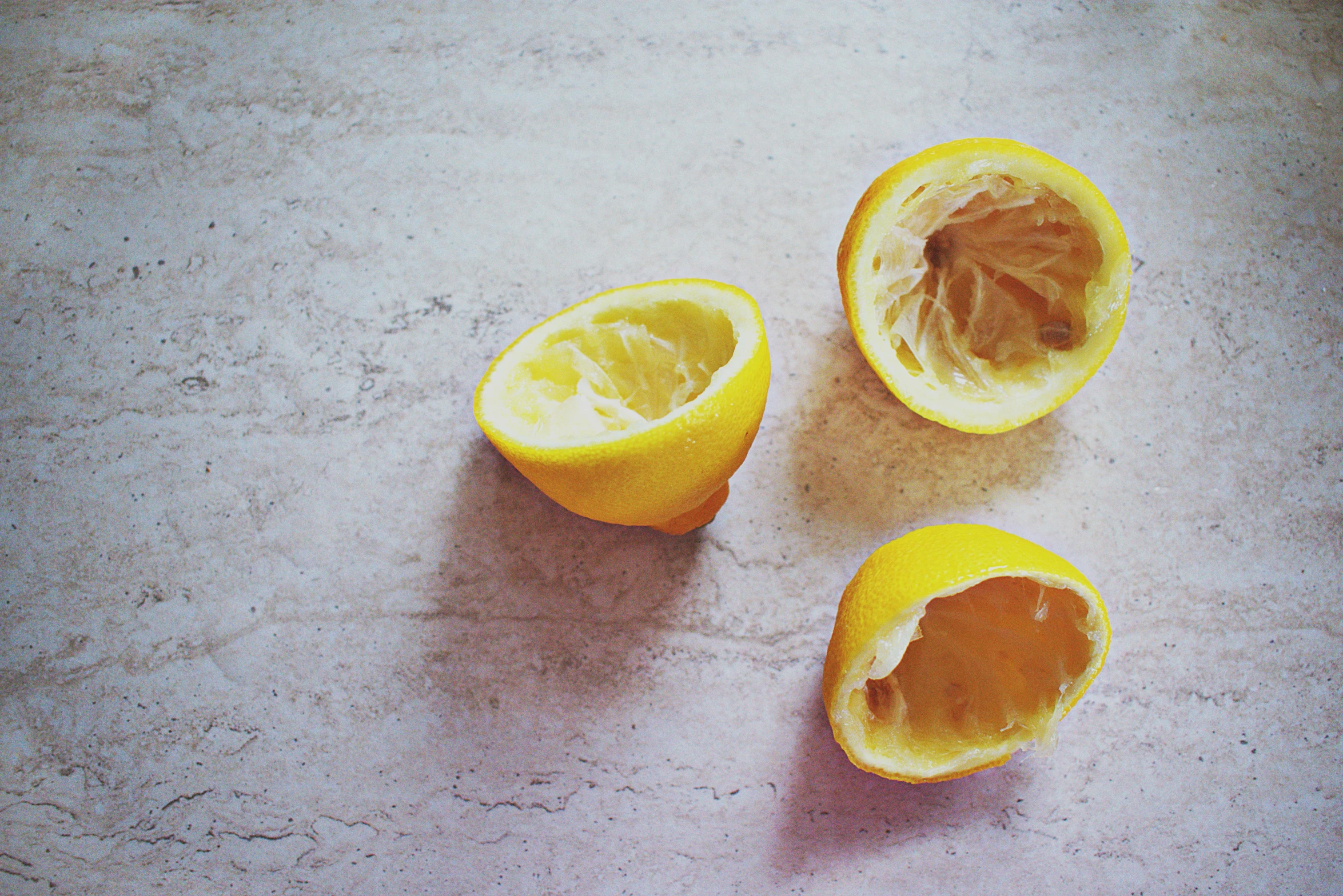 two halves of an orange cut in half