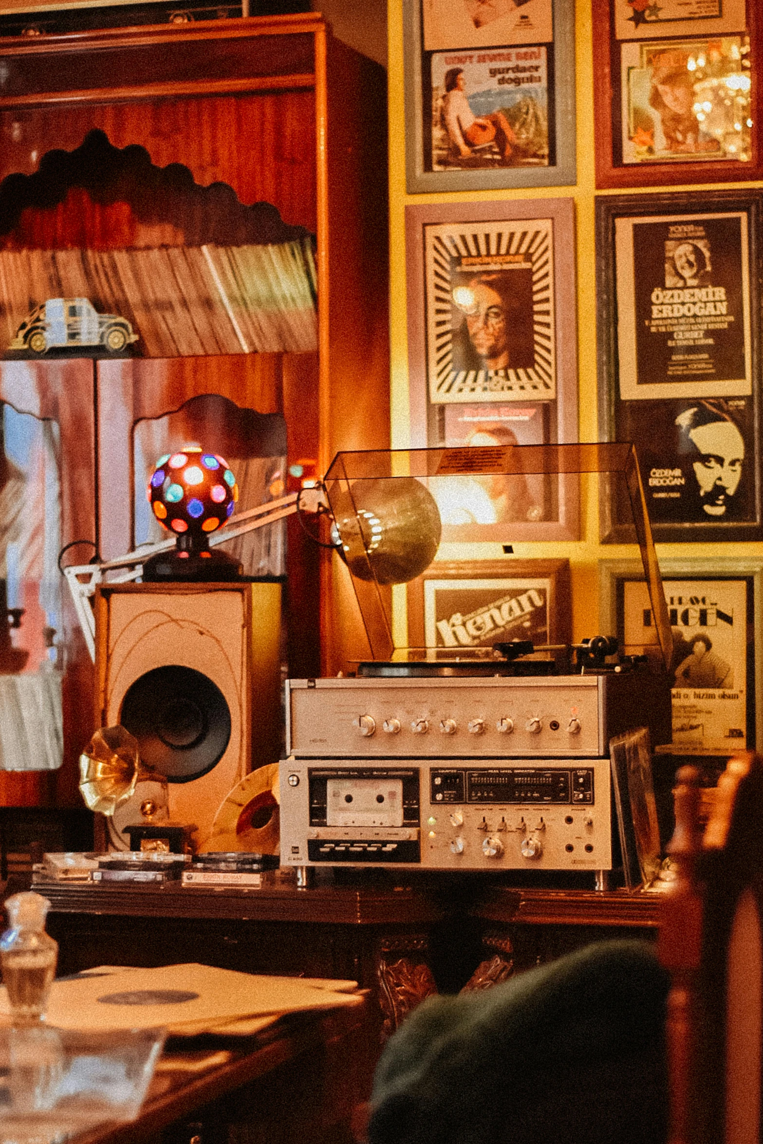 an old fashioned boom sitting next to a stereo