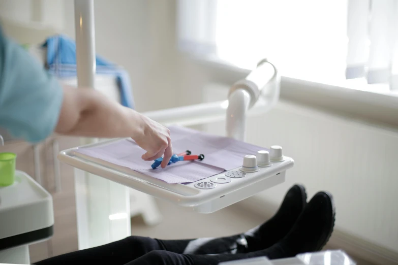 a man is doing soing in a tray