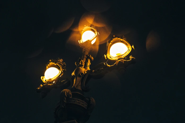 street light on a pole illuminated by a single bulb