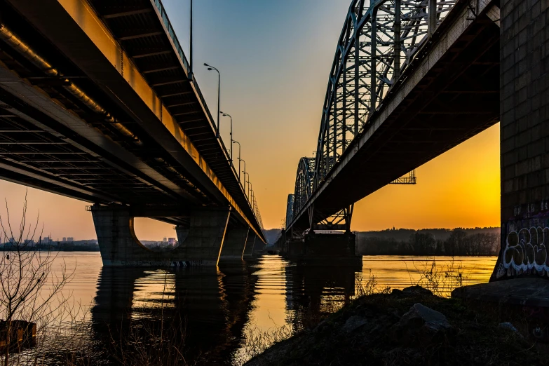 the train bridge is going over water on it