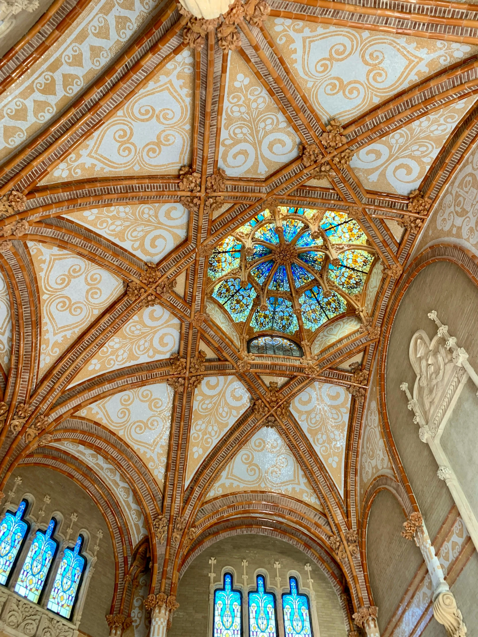 the ceiling is decorated with beautiful wood trimming